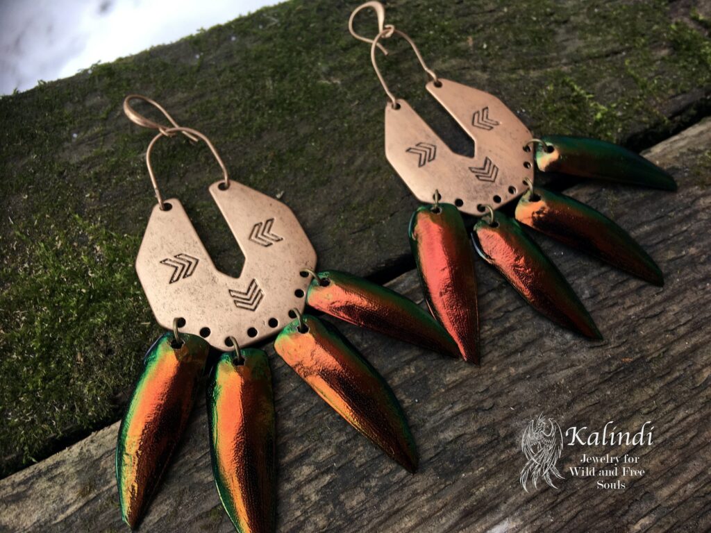 Earrings with wings of gold