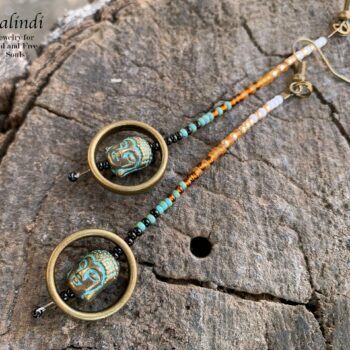 Handmade beaded earrings with Buddha