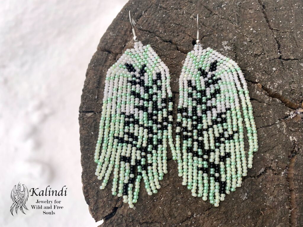 Delicate beaded earrings with a twig