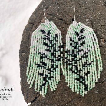 Delicate beaded earrings with a twig