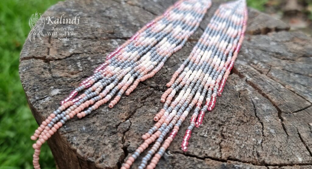 Long Pink Beaded Feather Earrings.