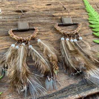 Handmade earrings with feathers