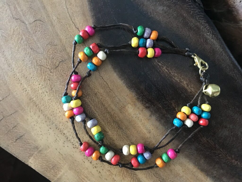 Handmade Three-Strand Macramé Anklet with Colorful Beads and Gold-Toned Bell