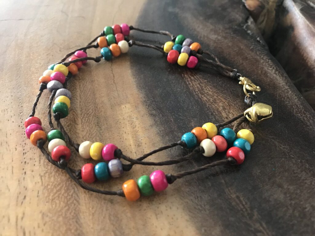 Handmade Three-Strand Macramé Anklet with Colorful Beads and Gold-Toned Bell