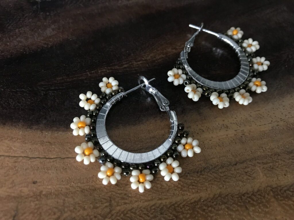 Handmade Beaded Hoop Earrings with Metallic, Milky, and Light Orange Flowe