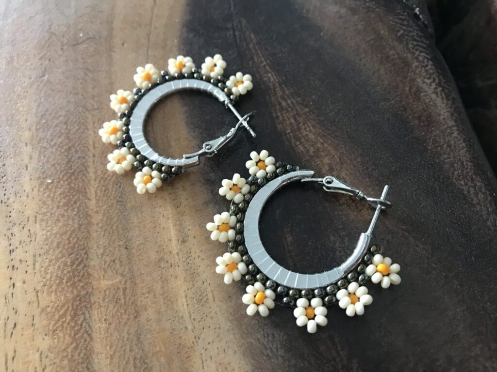 Handmade Beaded Hoop Earrings with Metallic, Milky, and Light Orange Flowe